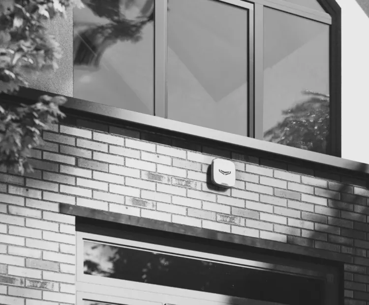 Ajax Systems alarm installed on external wall